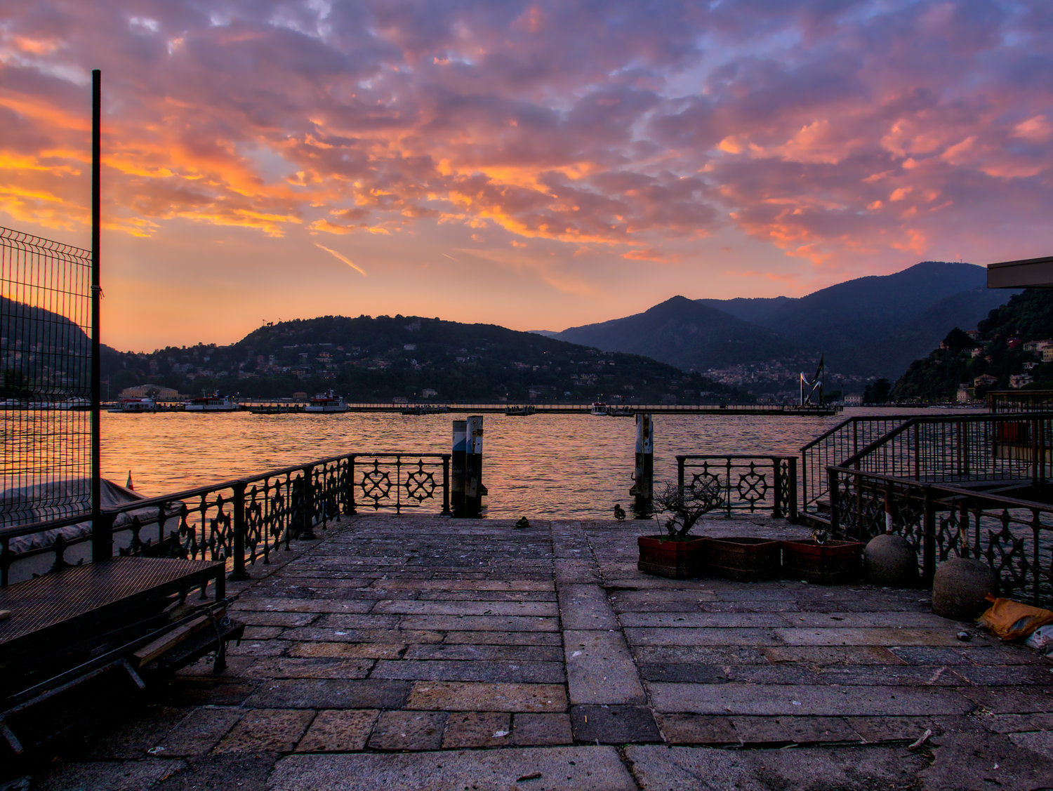 lake como waterfront at sunset